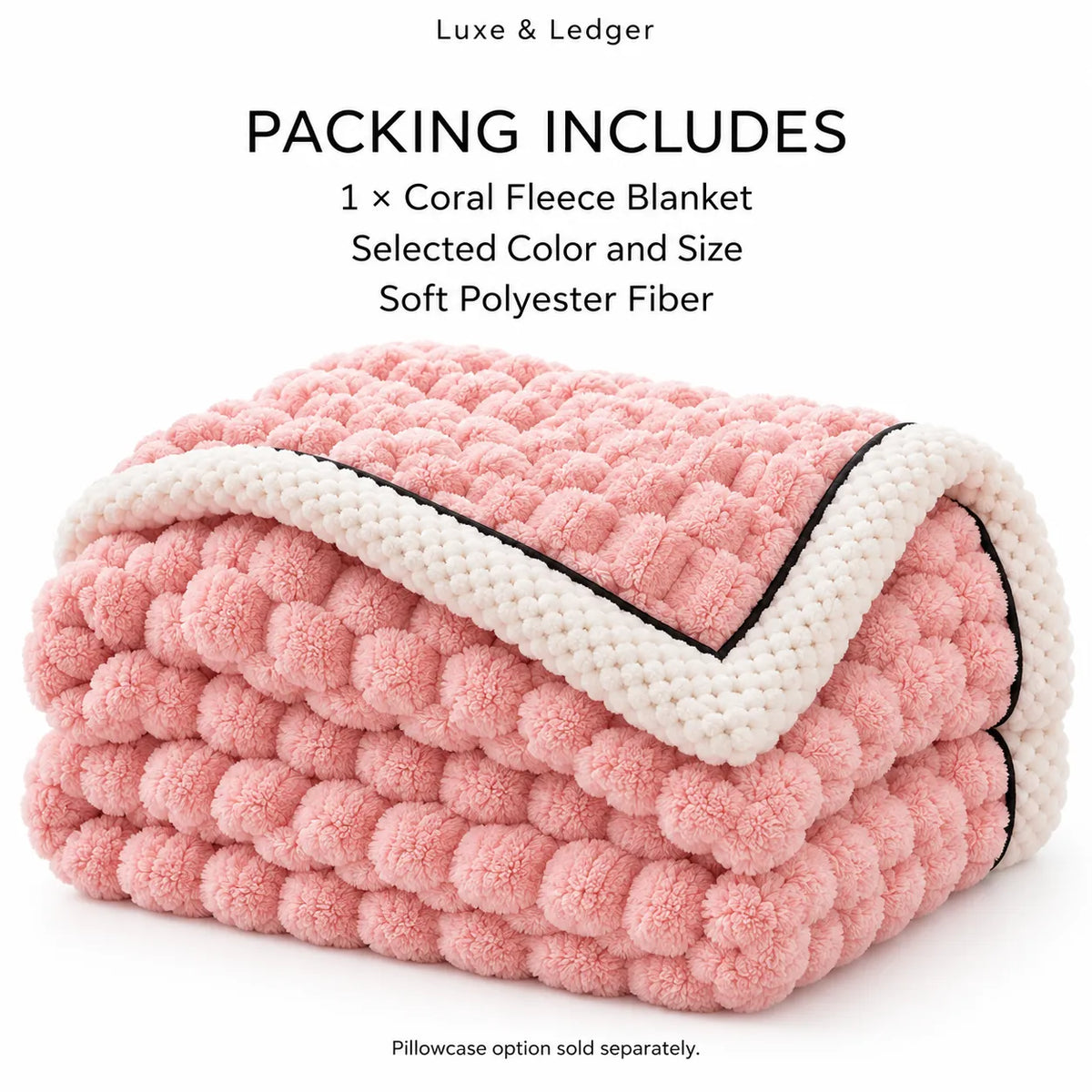 A folded coral pink textured blanket with a cream border and black piping, shown on a white background with text stating 'PACKING INCLUDES 1 x Coral Fleece Blanket' and 'Luxe & Ledger'.