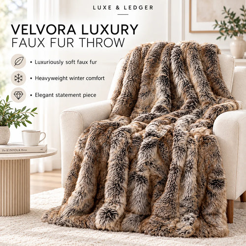 A plush faux fur throw blanket in mixed brown, beige, and gray tones draped over a cream armchair in a bright living room. Text on the left reads 'VELVORA LUXURY FAUX FUR THROW' with feature icons and 'LUXE & LEDGER' at the top.