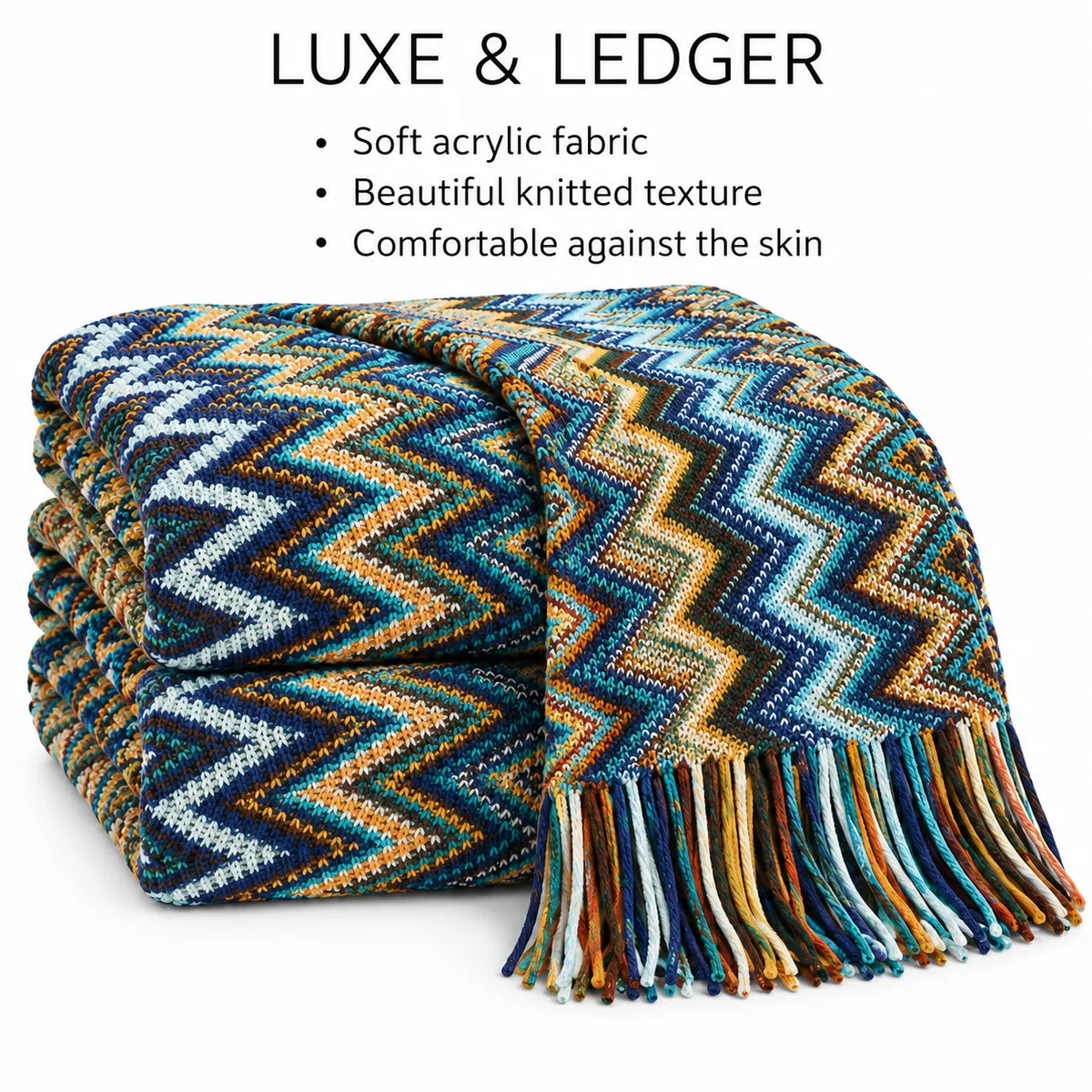 A folded multicolor chevron knit throw blanket with fringe, shown on a white background with text reading 'LUXE & LEDGER' and bullet points describing soft acrylic fabric, beautiful knitted texture, and comfort against the skin.