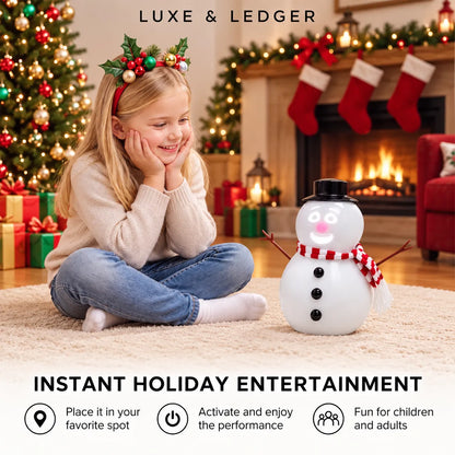 A young girl in a holiday headband sits on a beige rug in a cozy living room, smiling at a small snowman toy. The scene includes a decorated Christmas tree, fireplace, stockings, and wrapped gifts, with text reading 'LUXE & LEDGER' and 'INSTANT HOLIDAY ENTERTAINMENT' plus feature icons.