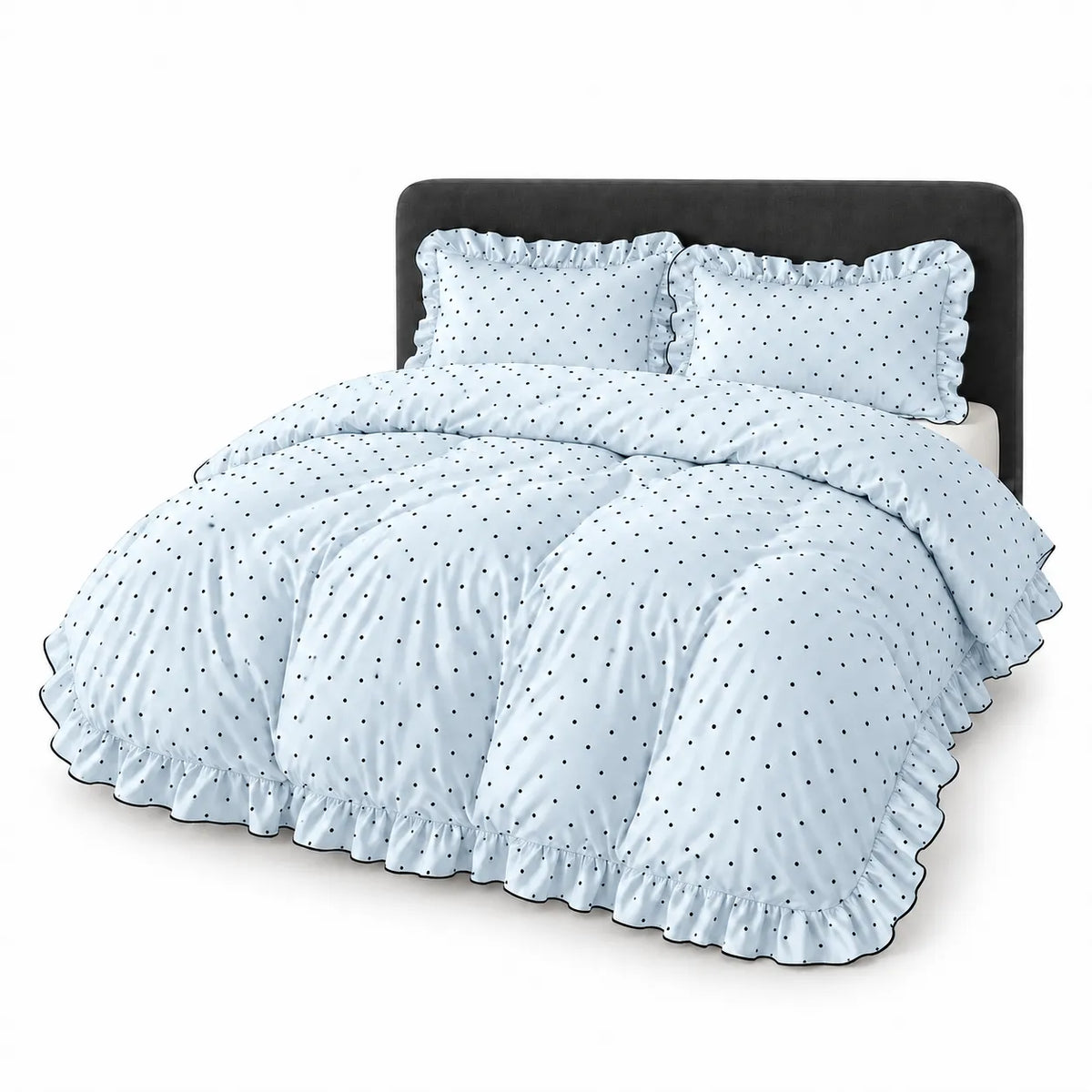 A light blue bedding set with a black polka dot pattern and ruffled edges, styled on a bed with a dark gray headboard against a white background.