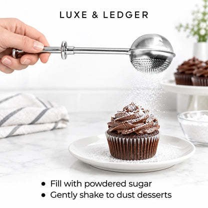 A hand holds a stainless steel sifter over a chocolate cupcake on a white plate, dusting the dessert with powdered sugar. The scene includes the text 'LUXE & LEDGER' at the top and usage text at the bottom on a clean kitchen-style background.