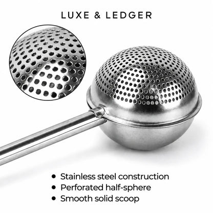 Stainless steel half-sphere scoop with a perforated dome top and long handle, shown on a white background with a circular close-up of the perforated surface and text reading 'LUXE & LEDGER' and product features.