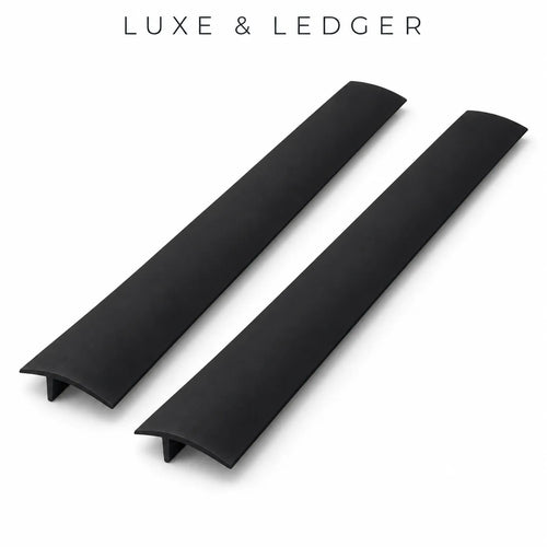 Two long black silicon drawer divider bars shown on a clean white background, with the text 'LUXE & LEDGER' printed above.