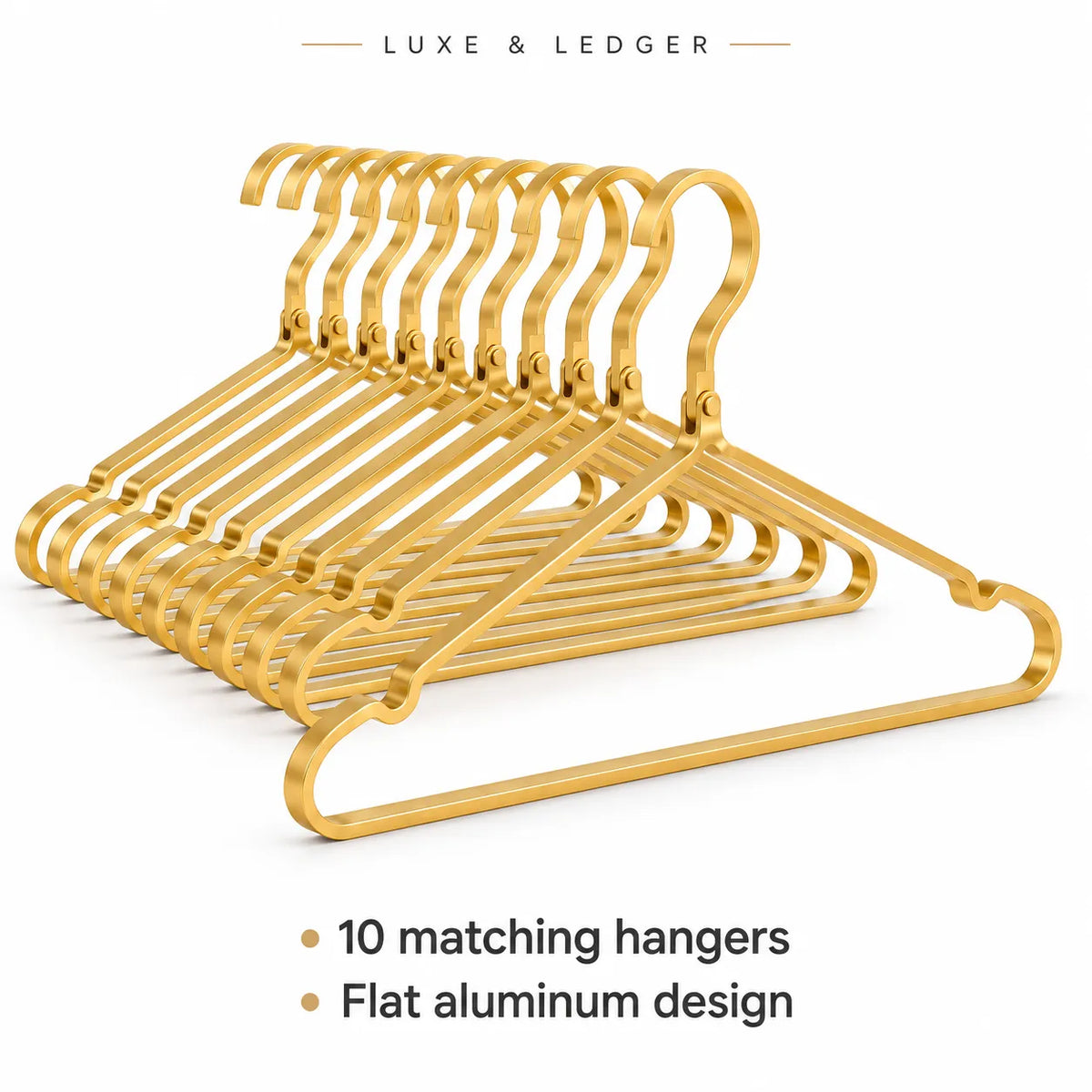 Ten gold-colored flat aluminum hangers arranged in a fan shape on a white background, with text overlays reading 'LUXE & LEDGER' at the top and '10 matching hangers' and 'Flat aluminum design' at the bottom.