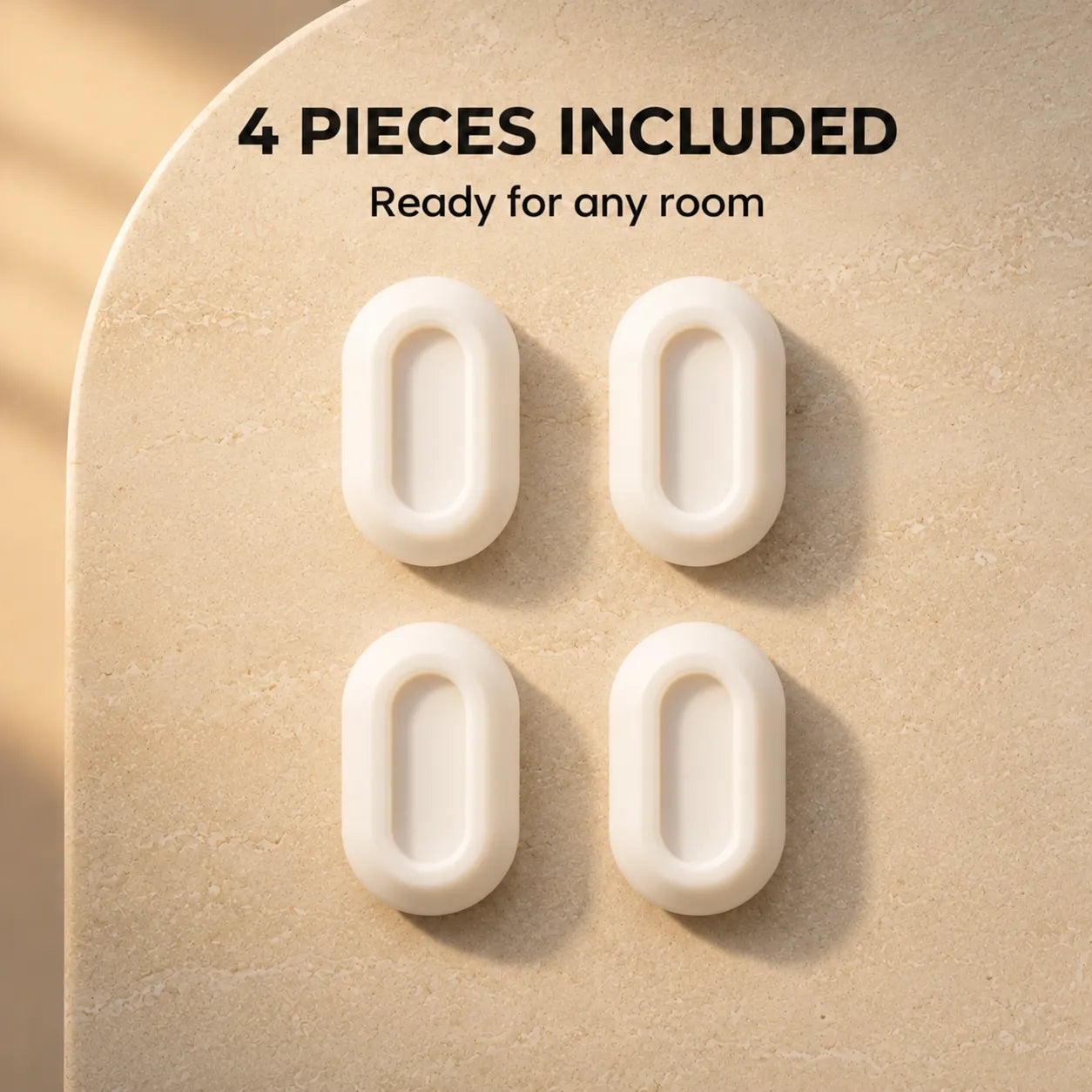 Four white oval door stoppers arranged in a 2x2 grid on a beige textured surface, with the text '4 PIECES INCLUDED' and 'Ready for any room' above them.