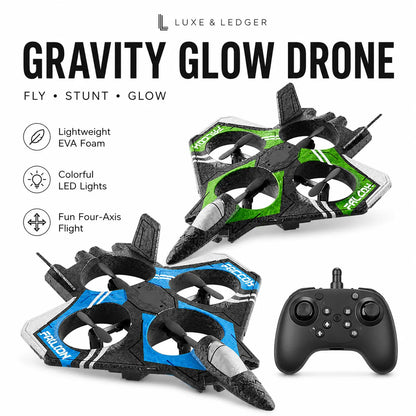 Luxe & Ledger Gravity Glow Drone set featuring two remote-controlled quadcopter drones, one with green accents and one with blue accents, alongside a black wireless controller on a white background with product feature callouts.