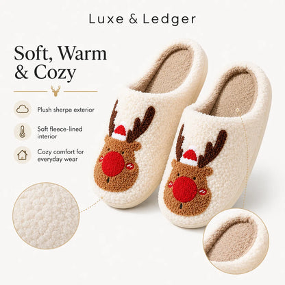 A pair of plush cream-colored slipper mugs with a brown reindeer face and red nose on the front, shown on a light beige background with marketing text and detail callouts.