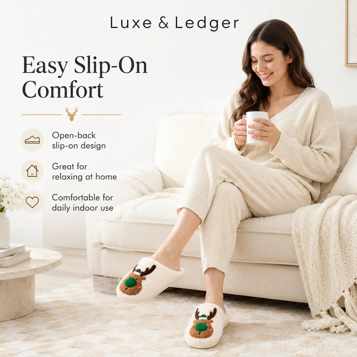 A woman sits on a cream sofa wearing a matching cream knit lounge set and white slip-on slippers with reindeer faces. The scene includes marketing text reading 'Luxe & Ledger' and 'Easy Slip-On Comfort,' plus feature callouts about the open-back slip-on design, comfort at home, and daily indoor use.