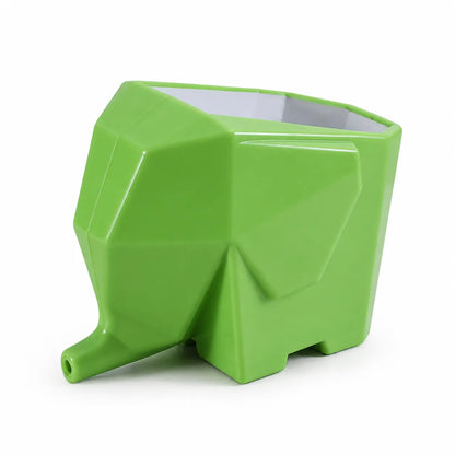 A bright green geometric elephant-shaped planter with a faceted, modern design, shown on a clean white background.