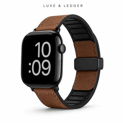 A brown leather watch band with black trim and a black buckle, shown attached to a black smartwatch on a clean white background. The text 'LUXE & LEDGER' is printed at the top.