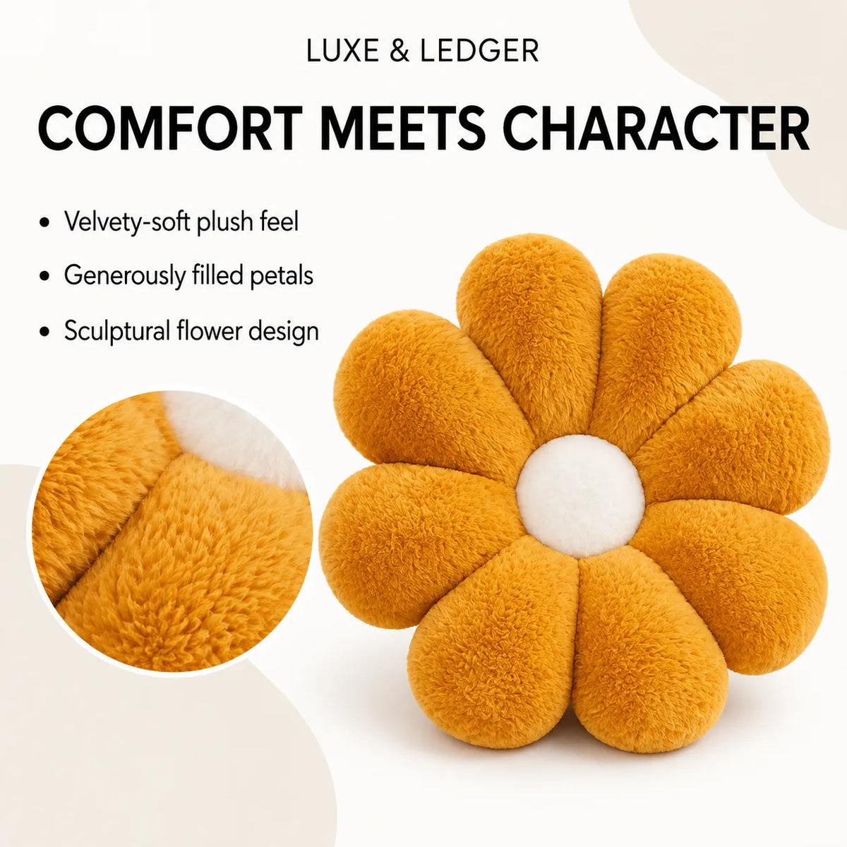 A flower-shaped plush cushion in a warm mustard yellow color with a white center, shown on a clean white background with promotional text and a circular close-up inset of the plush texture. Visible brand text at the top reads 'LUXE & LEDGER'.