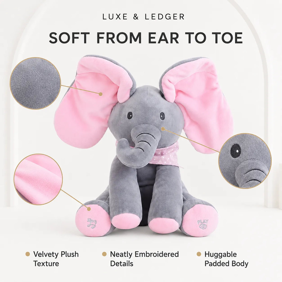 Peek-A-Boo Singing Elephant pink variant — soft plush texture, neatly embroidered details, huggable padded body
