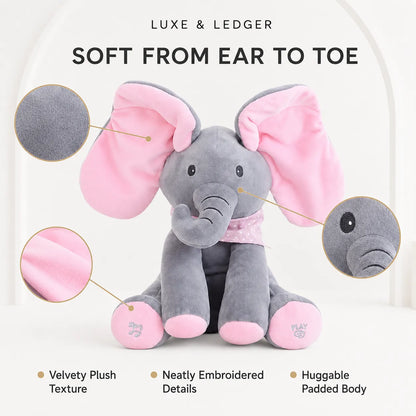 Peek-A-Boo Singing Elephant pink variant — soft plush texture, neatly embroidered details, huggable padded body