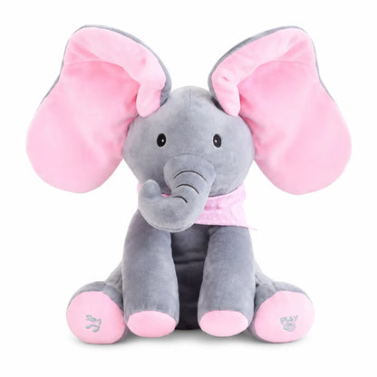 Peek-A-Boo Singing Elephant Soft Pink variant — front product shot, grey plush body with pink ears spread wide open