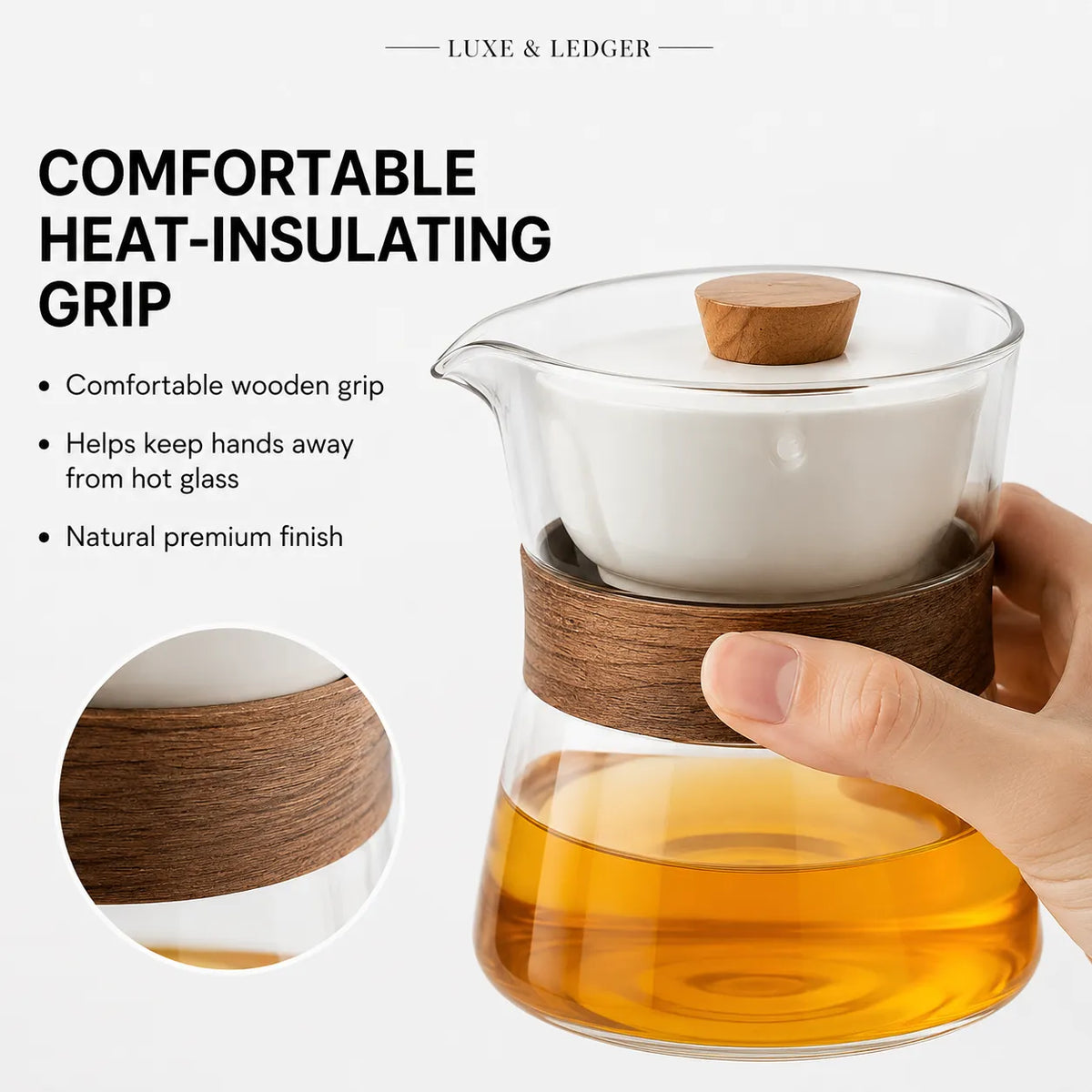 A clear glass teapot with a wooden handle and lid knob, shown with a hand holding the wooden grip to demonstrate comfort and heat insulation. The teapot contains amber tea, and the image includes marketing text on a clean white background.