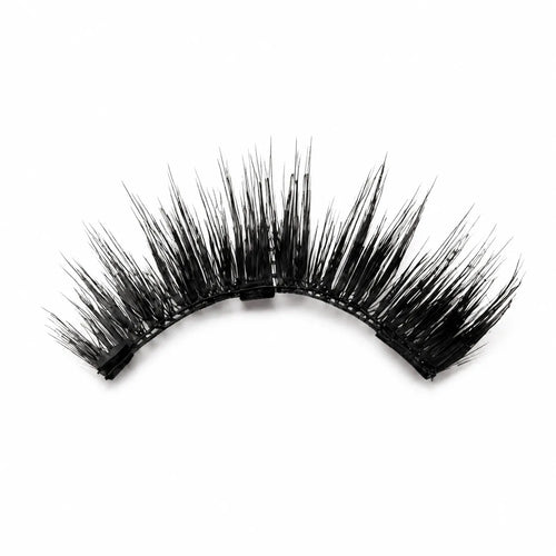 A single pair of black false eyelashes with long, wispy synthetic fibers on a plain white background.