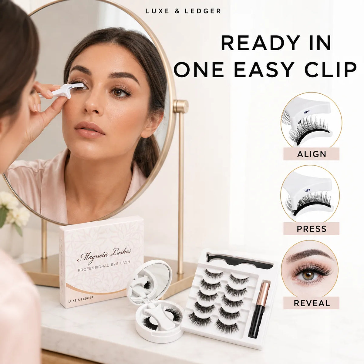 Magnetic eyelash clips shown on a vanity with a woman applying false eyelashes in front of a mirror. The image includes product packaging, a tray of false eyelashes, a small mirror, and instructional callouts reading Align, Press, and Reveal.