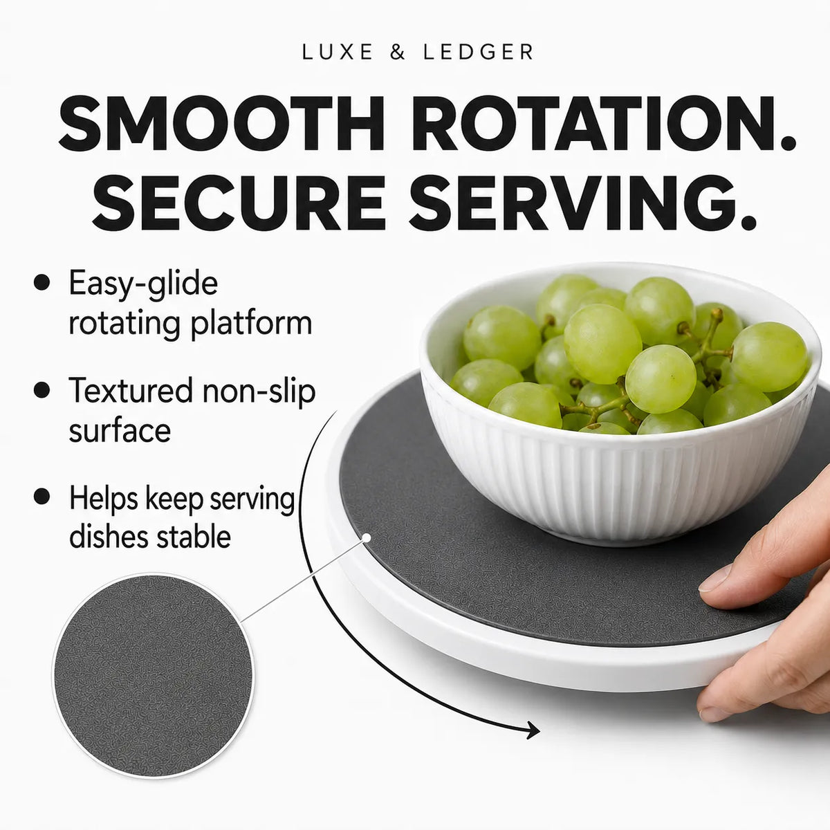 A Luxe & Ledger rotating serving platform shown with a white bowl of green grapes on top, with a hand holding the platform edge. Text highlights smooth rotation, secure serving, and features like an easy-glide rotating platform and textured non-slip surface.