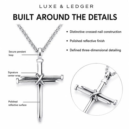 Silver cross pendant necklace with a chain on a white background, labeled with features such as 'Secure pendant loop,' 'Signature center wrap,' and 'Polished reflective surface,' with an inset close-up and the text 'LUXE & LEDGER BUILT AROUND THE DETAILS.'.