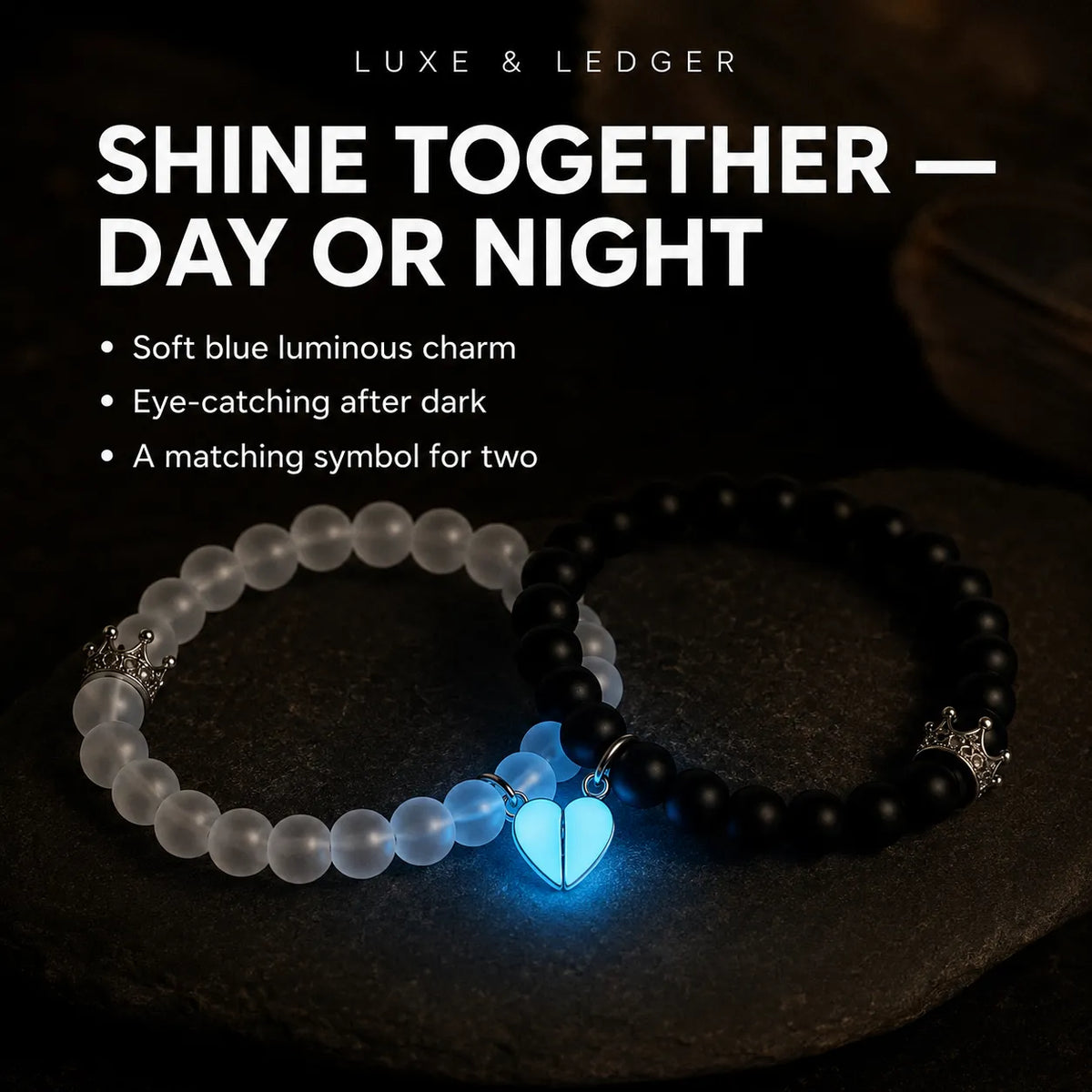 Two beaded bracelets displayed on a dark stone surface under low light, with one bracelet in translucent frosted white beads and the other in glossy black beads. A glowing blue heart charm hangs from the bracelets, and marketing text at the top reads 'LUXE & LEDGER' and 'SHINE TOGETHER — DAY OR NIGHT'.