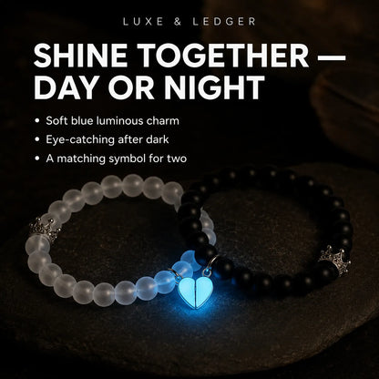 Two beaded bracelets displayed on a dark stone surface under low light, with one bracelet in translucent frosted white beads and the other in glossy black beads. A glowing blue heart charm hangs from the bracelets, and marketing text at the top reads 'LUXE & LEDGER' and 'SHINE TOGETHER — DAY OR NIGHT'.