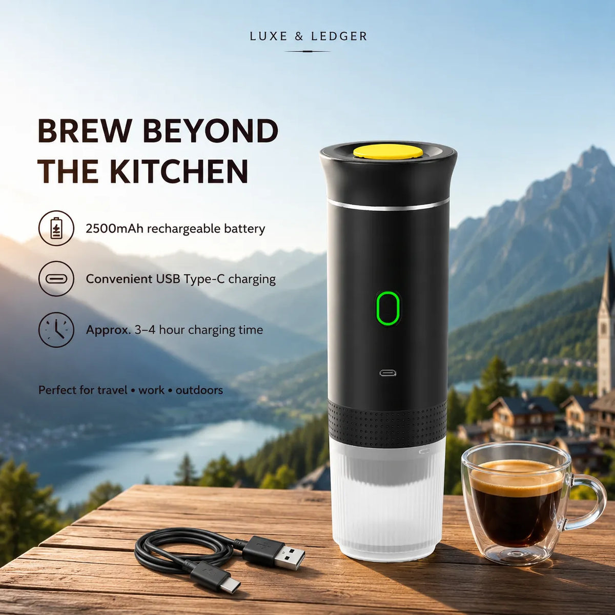 A portable electric coffee maker by Luxe & Ledger stands on a wooden table outdoors, with a cup of espresso and a USB charging cable beside it. The background shows a scenic mountain lake landscape.