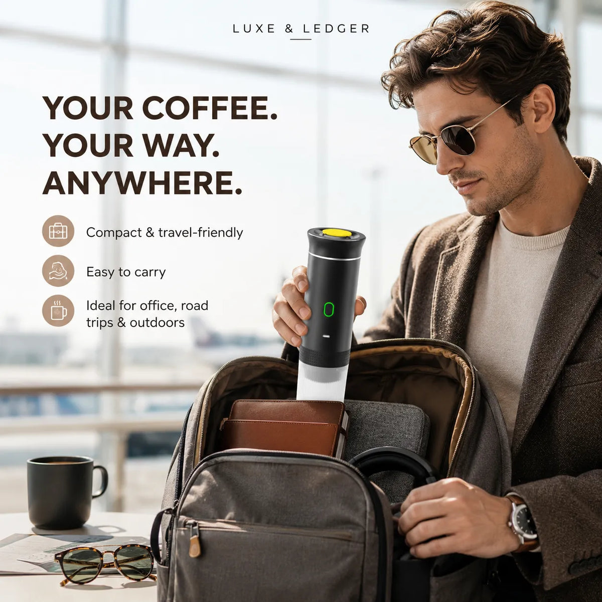 A man wearing sunglasses and a brown blazer packs a portable coffee maker into a gray backpack, with the text 'YOUR COFFEE. YOUR WAY.