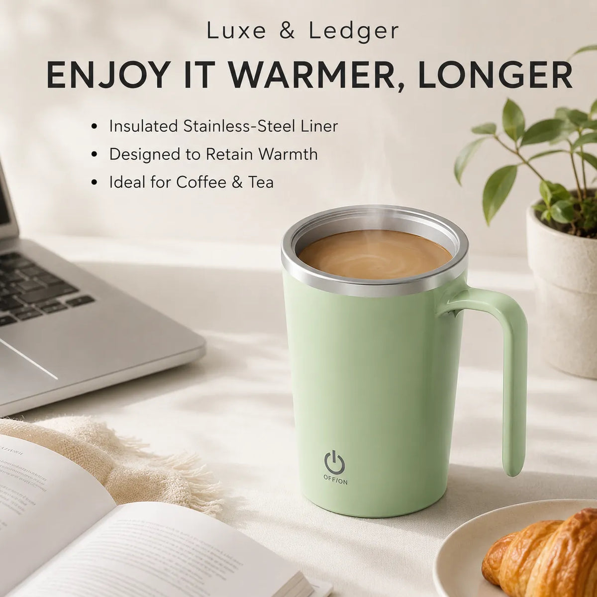 A light green insulated travel mug filled with coffee sits on a tabletop in a styled office/lifestyle scene with a laptop, book, plate, and plant. Text on the image reads 'Luxe & Ledger' and 'ENJOY IT WARMER, LONGER' with feature bullet points about an insulated stainless-steel liner and warmth retention.
