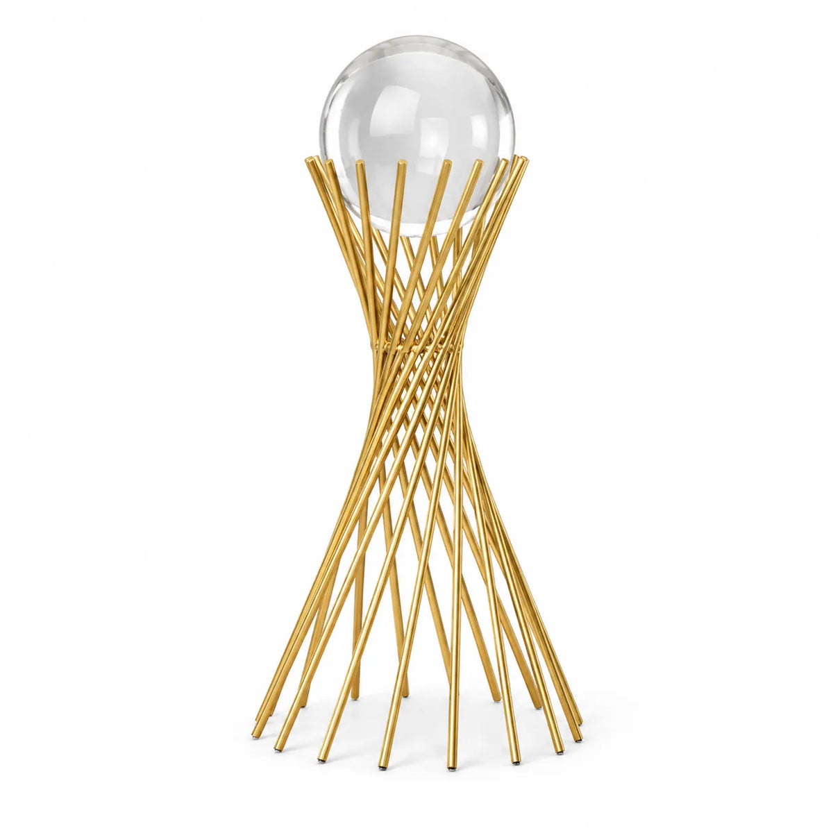 A modern gold metal sculpture stand with a twisted, lattice-like base and a clear glass sphere resting on top, set against a plain white background.