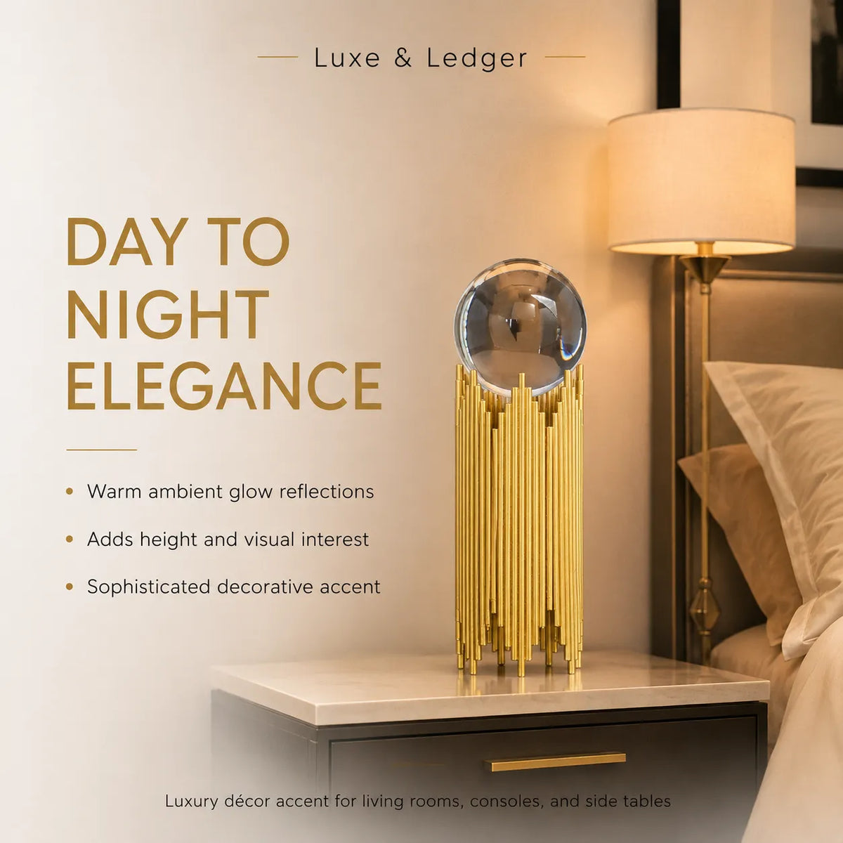 A luxury table lamp with a gold metallic fluted base and a clear glass sphere on top, displayed on a bedside table next to a lit lamp in a bedroom setting. Text overlays read 'Luxe & Ledger' and 'DAY TO NIGHT ELEGANCE'.