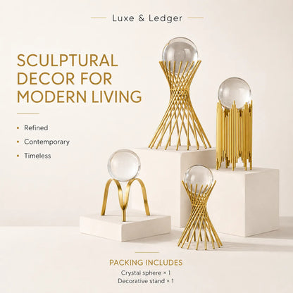 Three gold-toned sculptural crystal sphere decor pieces displayed on white pedestals against a warm cream background, with text reading 'Luxe & Ledger' and 'Sculptural Decor for Modern Living.'.