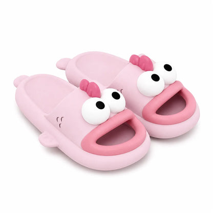 Pink cartoon-style toddler slide sandals with large white eyes and pink bows, shown on a clean white background.