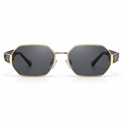 Oversized geometric sunglasses with a gold metal frame and dark gray lenses, shown from the front on a white background.