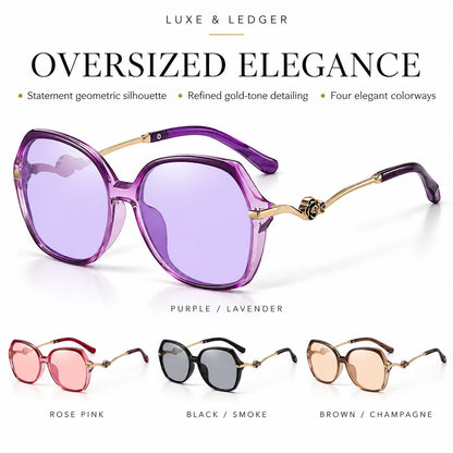 Oversized geometric sunglasses with purple lenses and gold-tone arms, shown on a white background with the text 'OVERSIZED ELEGANCE' and smaller colorway options labeled Rose Pink, Black / Smoke, and Brown / Champagne.