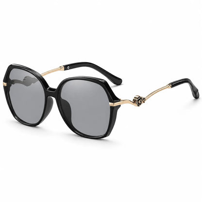 A promotional graphic for Luxe & Ledger sunglasses showing four color options in a 2x2 grid: purple/lavender, rose pink, black smoke, and brown/champagne. Each pair has oversized round lenses and gold-tone metal arms.