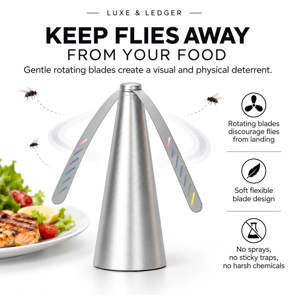 A stainless steel fly trap with two angled blades, shown on a white background with marketing text, fly illustrations, and a plate of food at the lower left.