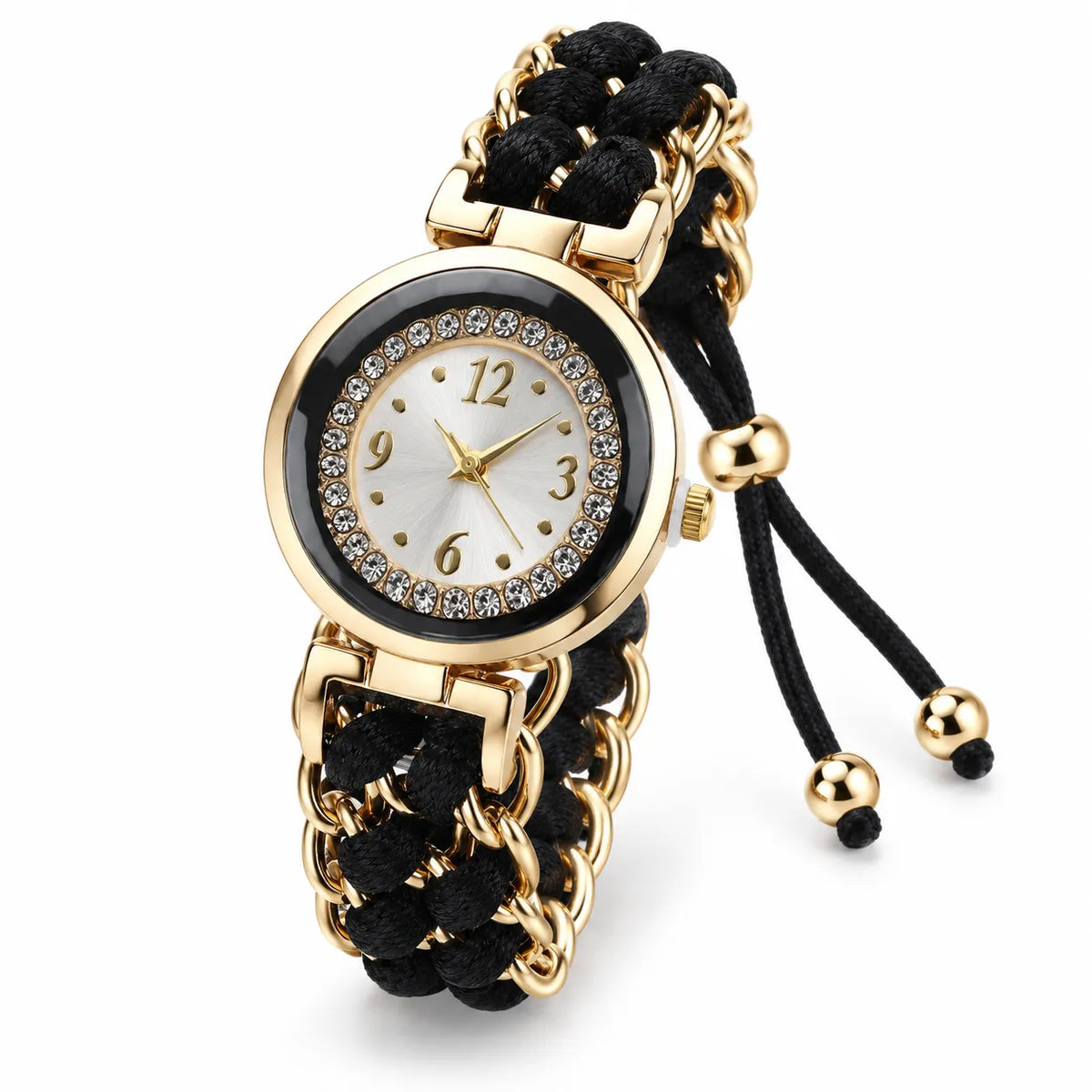 A women's wristwatch with a round gold-tone case, white dial, crystal-studded bezel, and a braided black cord strap with gold-tone chain accents and dangling beads, shown on a white background.