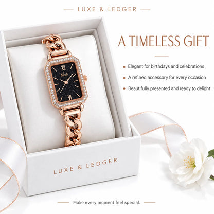 A rose gold rectangular watch with a rhinestone bezel and chain strap, presented in a white gift box. The watch features a black dial with Roman numerals and the brand name 'Gloriette'.
