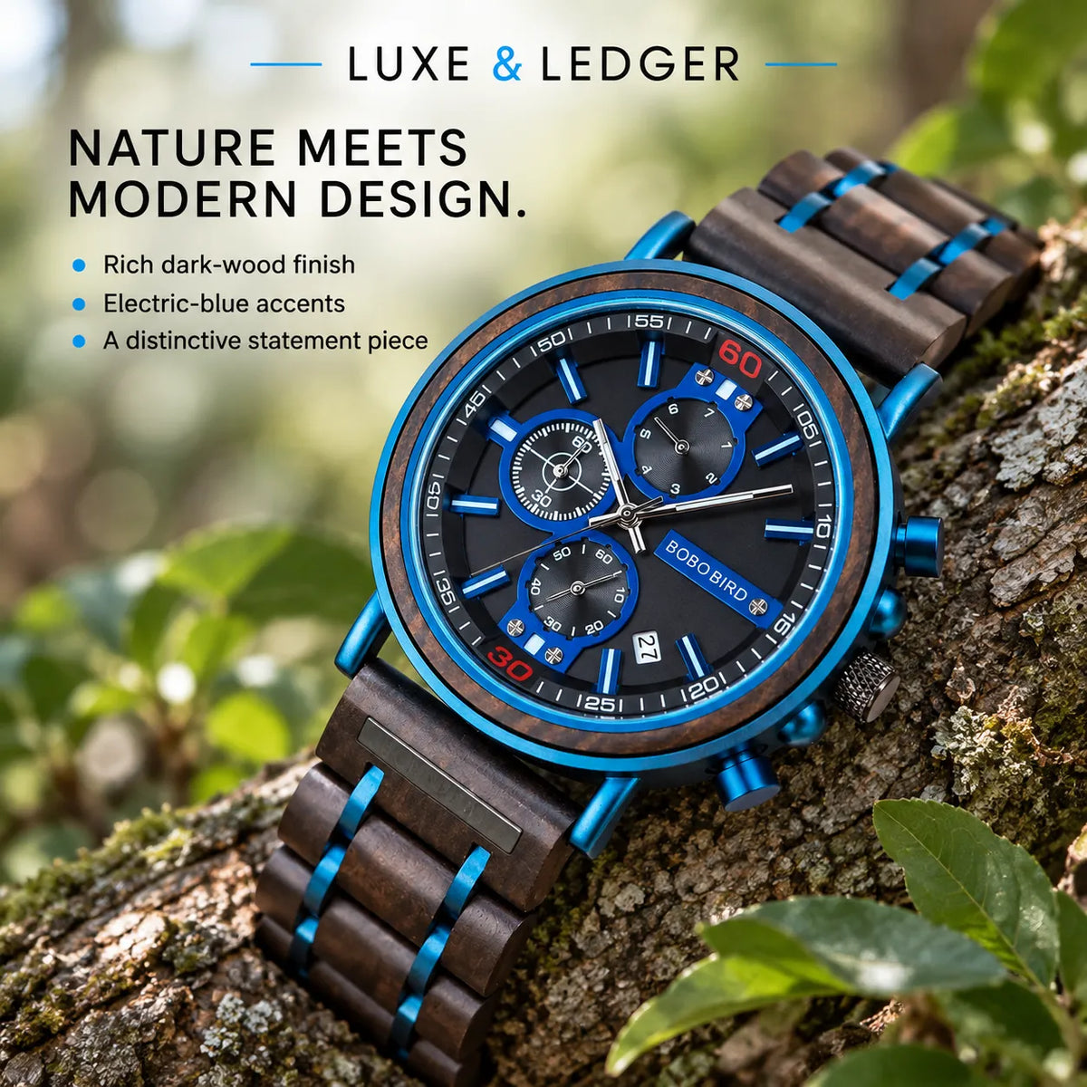 A luxury men's analog watch with a dark wood grain case and matching wood link bracelet with bright blue accents, resting on a tree trunk outdoors. The watch has a black dial with blue and red accents.