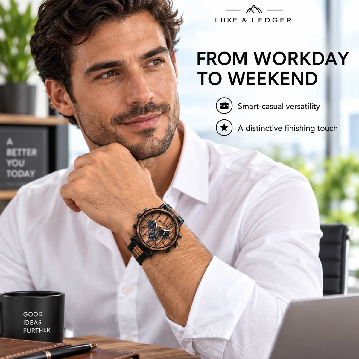 A man in a white dress shirt wearing a LUXE & LEDGER smart watch with a black strap and brown dial, sitting at a desk with a laptop and coffee mug in a bright office setting.