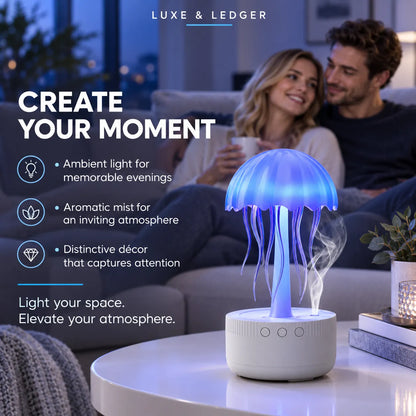 A jellyfish-shaped LED ambient light on a round white base, glowing with blue and purple light and emitting mist, shown on a white table in a cozy living room setting with a couple in the background. Text on the left reads 'LUXE & LEDGER CREATE YOUR MOMENT'.