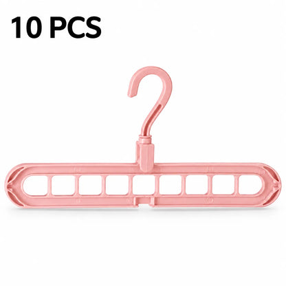 A pink plastic multi-hanger garment organizer with a hook at the top, shown on a white background with the text '10 PCS' in the upper left corner.