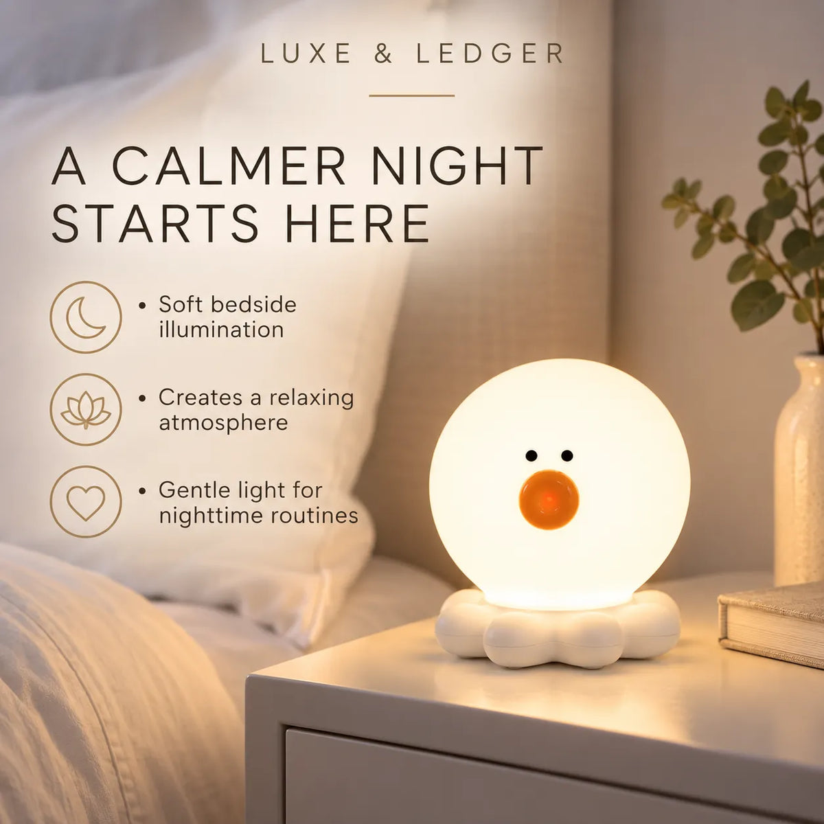A cute duck-shaped bedside lamp glowing softly on a white nightstand in a bedroom setting. The lamp has a white rounded body and cloud-like feet, with a small orange beak and black eyes.