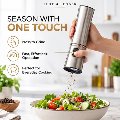 A hand holds a metallic electric pepper grinder over a salad bowl, grinding black pepper. The image includes marketing text reading 'LUXE & LEDGER' and 'SEASON WITH ONE TOUCH' with feature callouts, on a bright kitchen background.