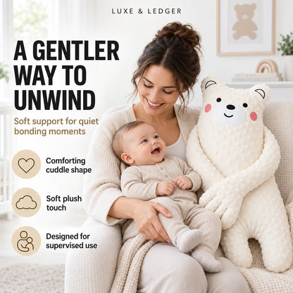 A woman in a cream knit outfit holds a baby in a cozy living room setting while next to a large cream plush bear toy. Text on the left reads 'A GENTLER WAY TO UNWIND' with features listed below, and the brand 'LUXE & LEDGER' appears at the top.