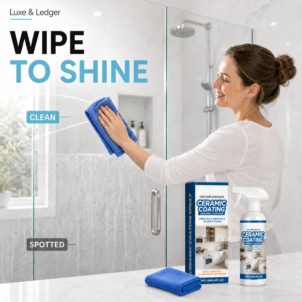 A woman in a white top wipes a glass shower door with a blue cloth in a bright bathroom. In the foreground, a boxed set and spray bottle of Luxe & Ledger Ceramic Coating and Protector, along with a folded blue cloth, are displayed on a white countertop.