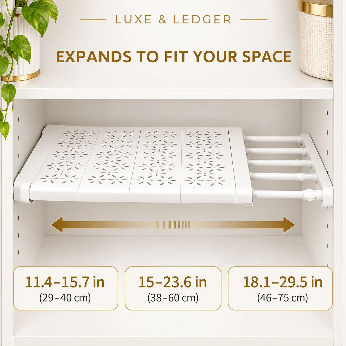 White under-shelf cabinet organizer tray shown installed inside a white cabinet, with text indicating expandable width and three size measurements in inches and centimeters.