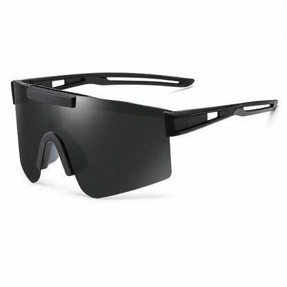 Black wrap-around shield sunglasses with a thick matte frame and dark tinted lenses, shown at a three-quarter angle on a white background.