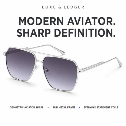 Luxe & Ledger modern aviator sunglasses with a slim silver metal frame and gradient gray lenses, shown on a white background with promotional text.